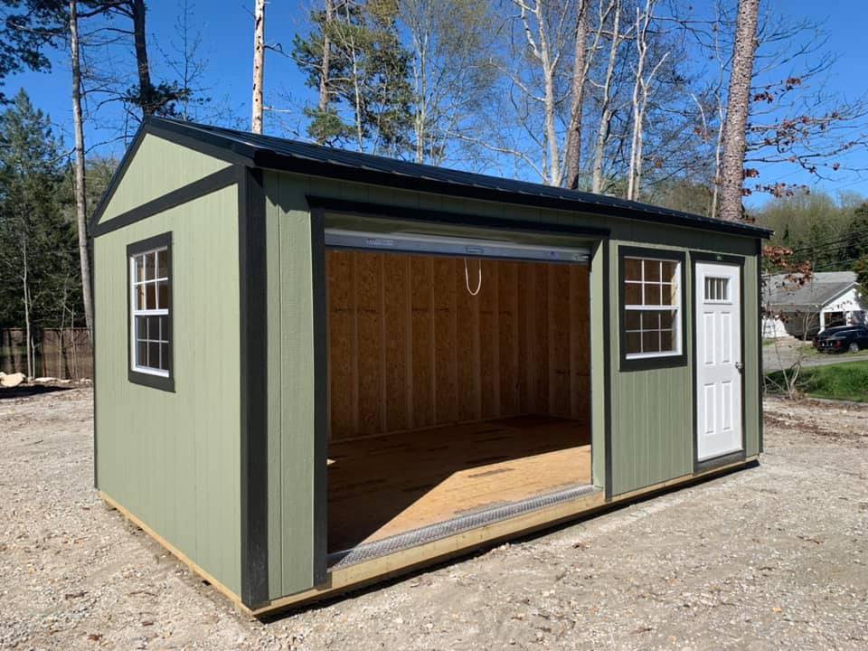 Portable backyard utility building on skids