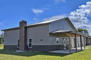 Custom metal barndominium with and front porch in Waycross GA