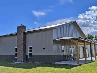 Custom metal barndominium with and front porch in Waycross GA
