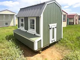 Custom-built portable hen house with nesting boxes