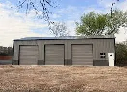 Custom metal garage with three color match roll up doors in Waycross GA