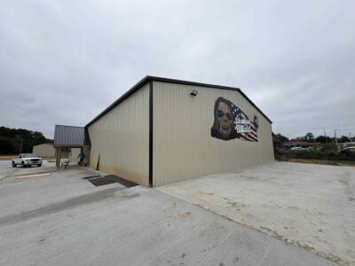 Exterior of metal building with mural in Blackshear Georgia