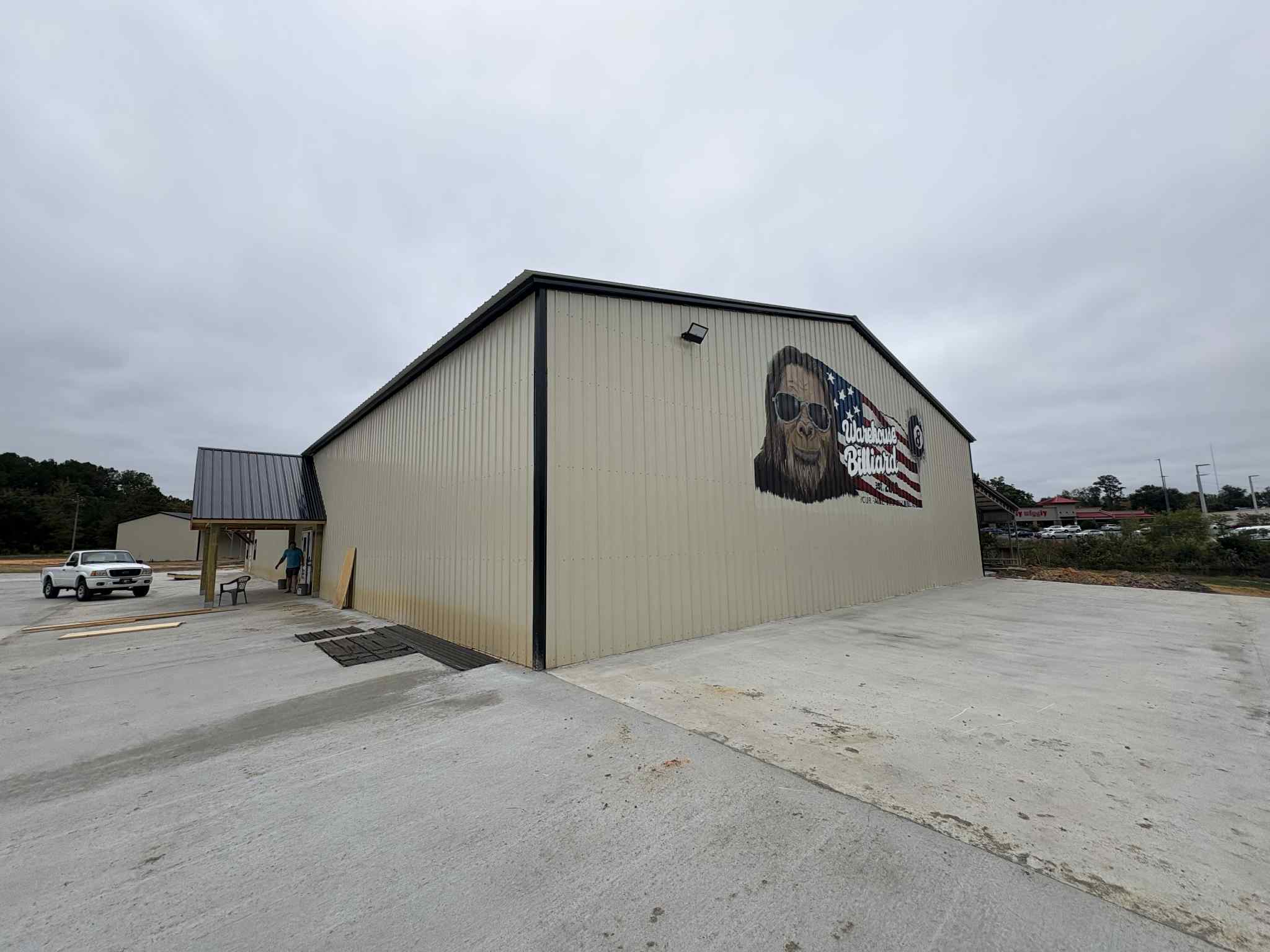 Exterior of metal building with mural in Blackshear Georgia
